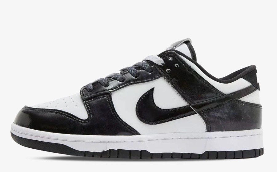 A Nike Dunk Low Panda sneaker in black and white, photographed side-on.